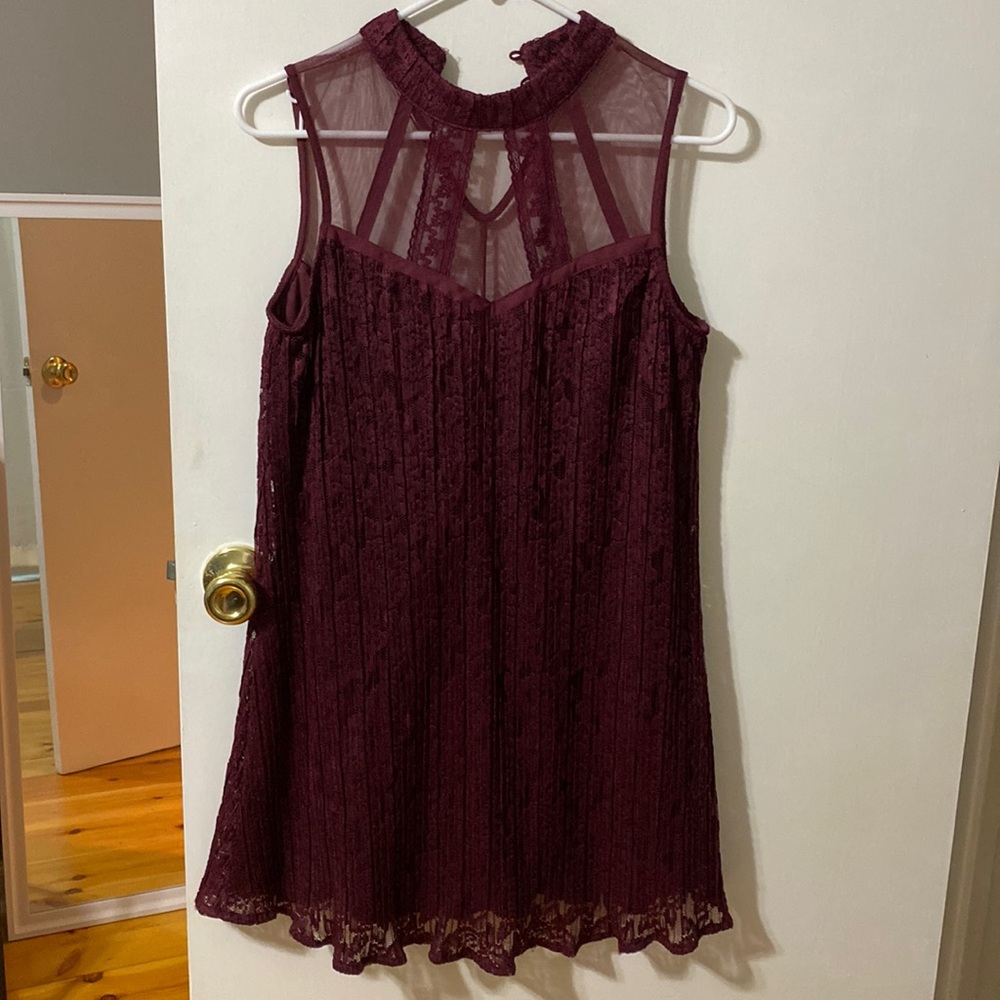 Burgundy color dress top it’s laces beautifully